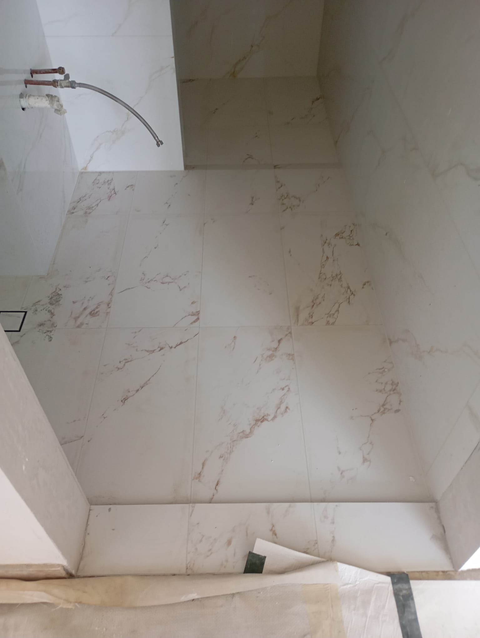 Toilet floor tile grouting